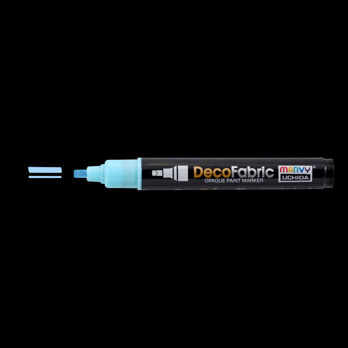 Decofabric fluorescent blue with cap off and color line at tip with a black background