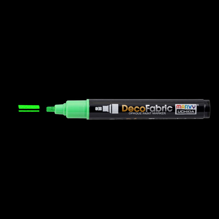 Decofabric fluorescent green with cap off and color line at tip with black background