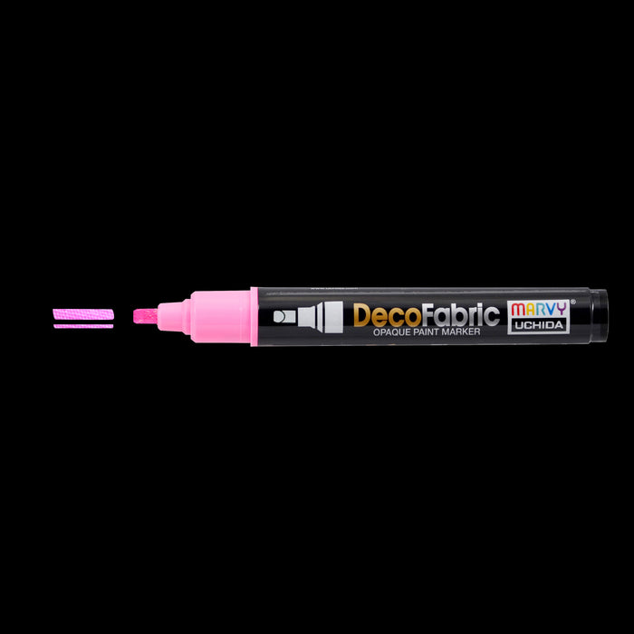 Decofabric marker fluorescent pink with cap off and a color line at tip with black background