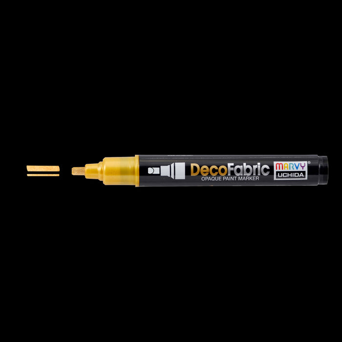 Decofabric  gold marker with cap off and color lines at tip with black background