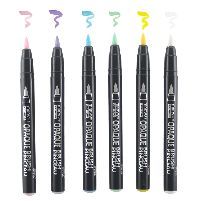 Opaque brush marker bubblegum pink, wisteria, pale blue, peppermint, yellow, and white with cap off and colors squiggles at the top of each marker.