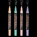 Marvy Uchida Bistro chalk marker four piece set uncapped; showing fine tips on a black background. Colors include pastel peach, peppermint, blush pink, and pale violet.